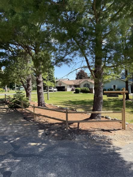 New wooden fence installation on a residential property