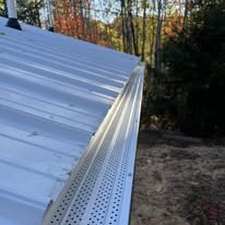 After seamless gutter installation on residential home