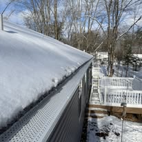 Residential home with newly installed seamless gutters